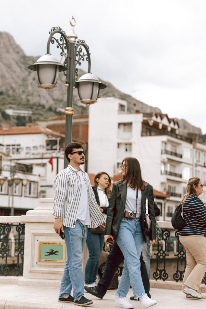 A group strolls through Amasya, Turkey, showcasing urban life and historic architecture.